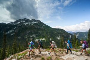 Teens back country hiking and camping in the pacific northwest on a teen summer adventure