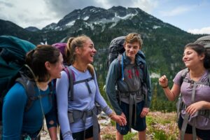 teen adventure trip backpacking in the pacific northwest celebrating summit of mountain summer 2024 hiking trip