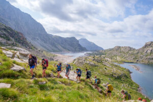 Teen adventure camp group hiking in the Spanish Pyrenees