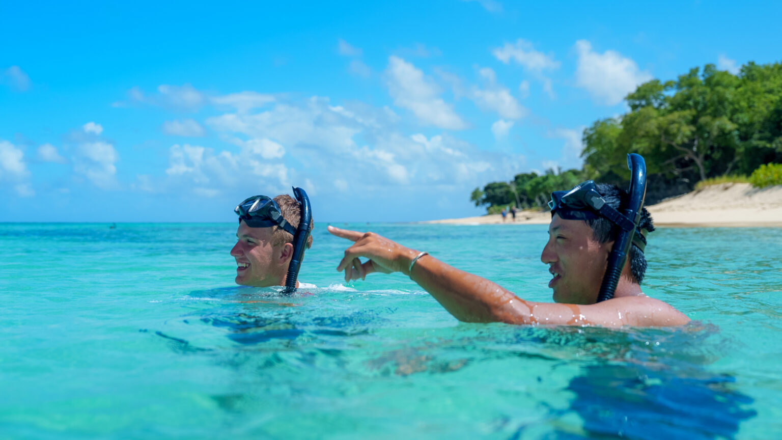 Two snorkelers on Apogee's community service trip in the Caribbean