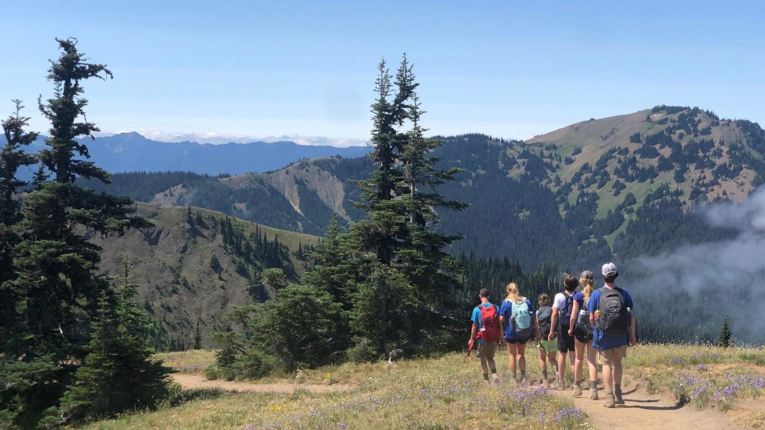 A photo of middle and high schoolers hiking in the Pacific Northwest