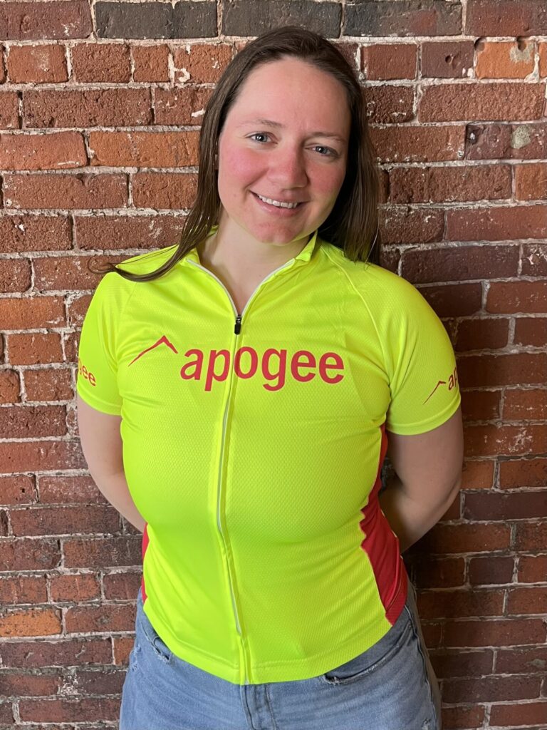 Assistant Director Andi is feeling highly-visible in the women’s cut bike jersey!