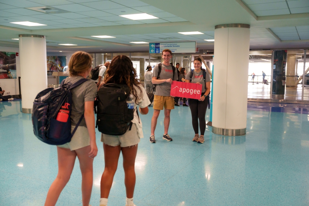trip leaders welcome students on Apogee's Caribbean Service adventure.